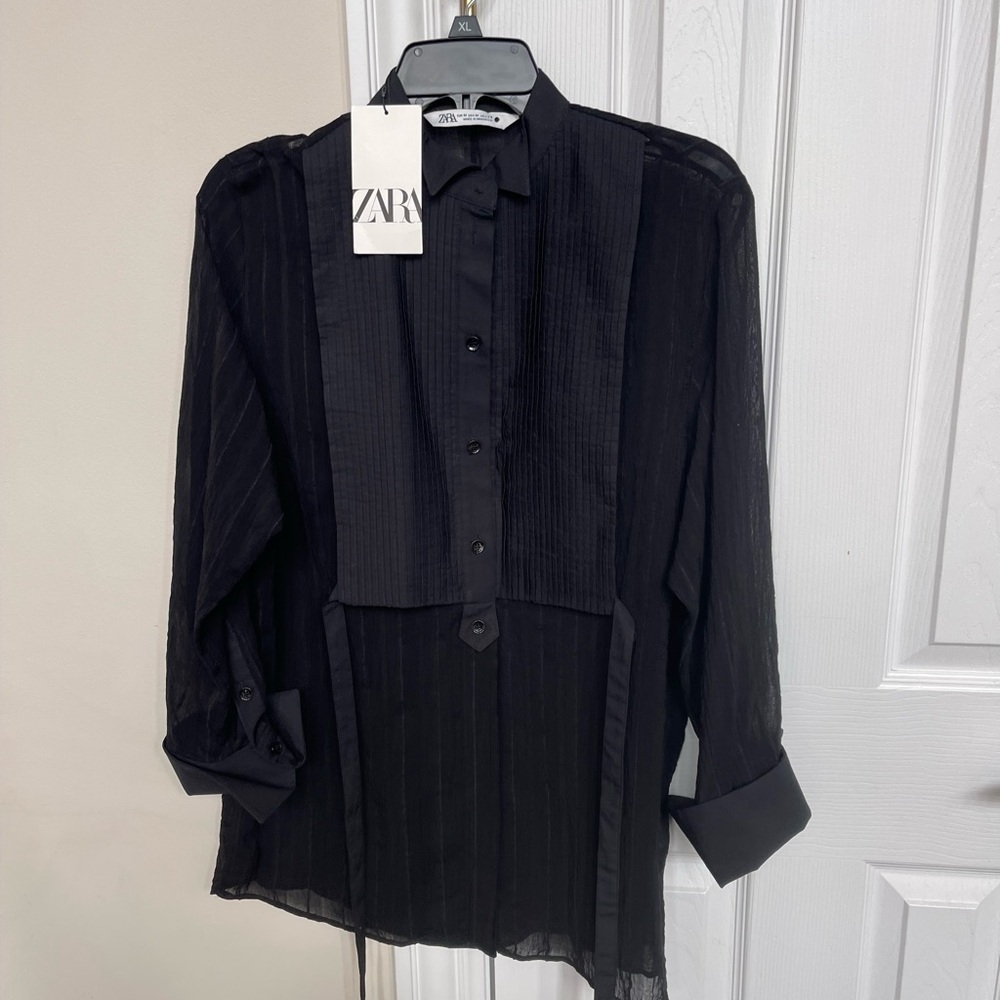 Brand new Black Zara Top, with tags, size M.